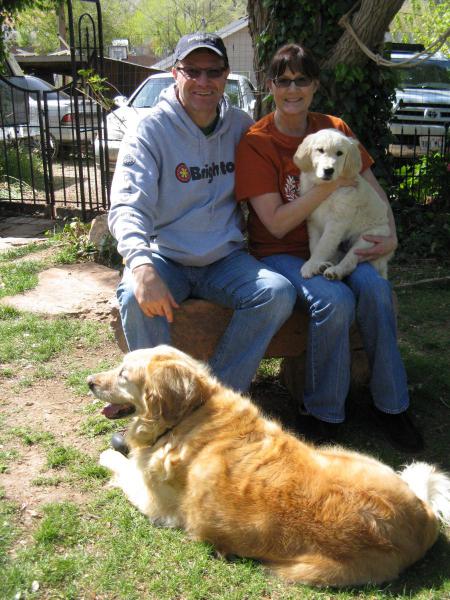 White Boy finds a new home!  The Browns with their 11 year old Golden.